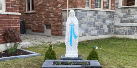 Bronze Virgin Mary statue installed in parish garden -- submitted by Father Michael O'Brien